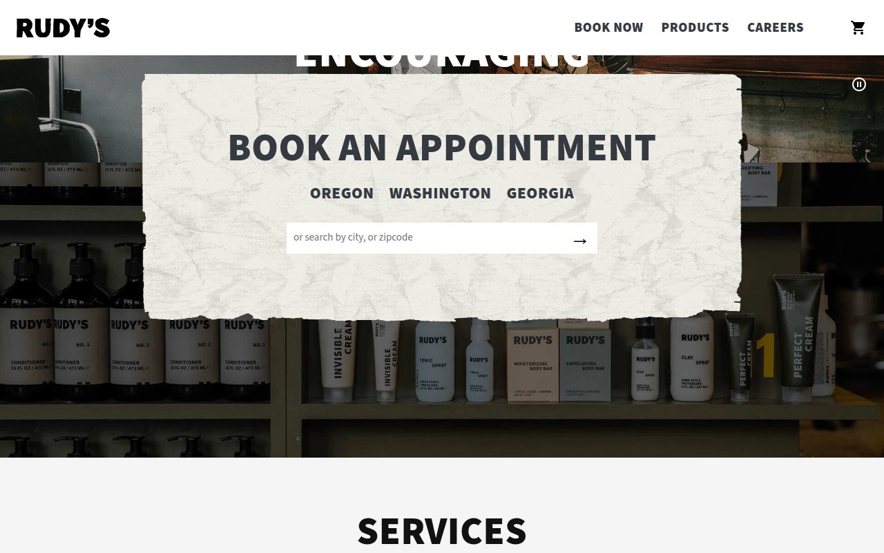 Rudy's Barbershop homepage with video hero and 30-year heritage messaging