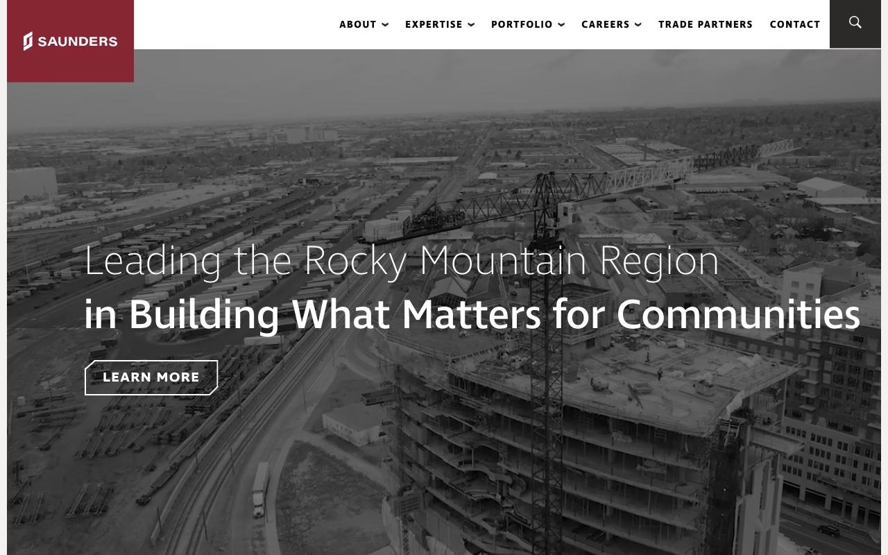 Saunders Construction homepage with Rocky Mountain focus and founder Dick Saunders legacy section