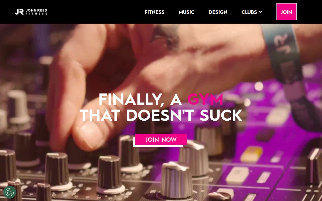 JOHN REED homepage with DJ turntable video and 'Finally, a gym that doesn't suck' headline