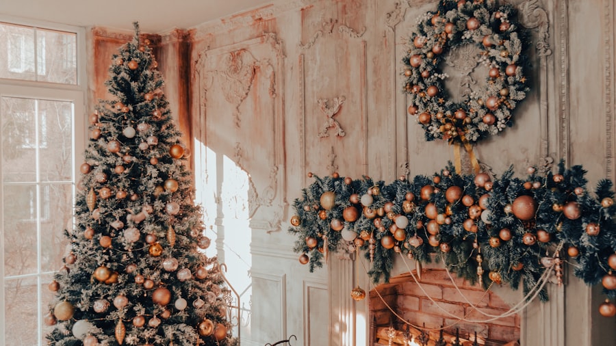 flocked Christmas tree and an ornament-covered wreath against a distressed plaster wall in warm light