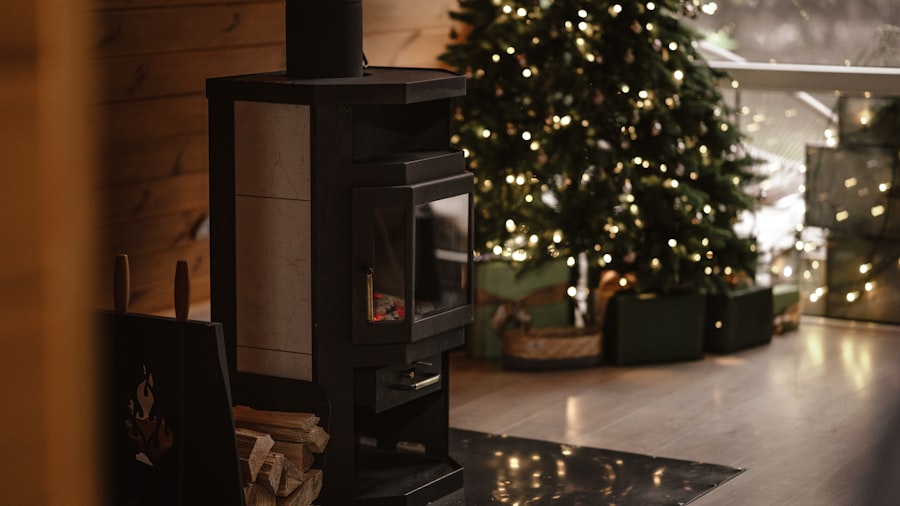 black wood stove beside a softly lit Christmas tree with warm bokeh lights on a wood floor