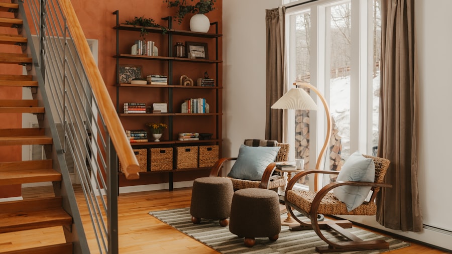bright study with open bookshelves, a staircase, a rocking chair, and a large window