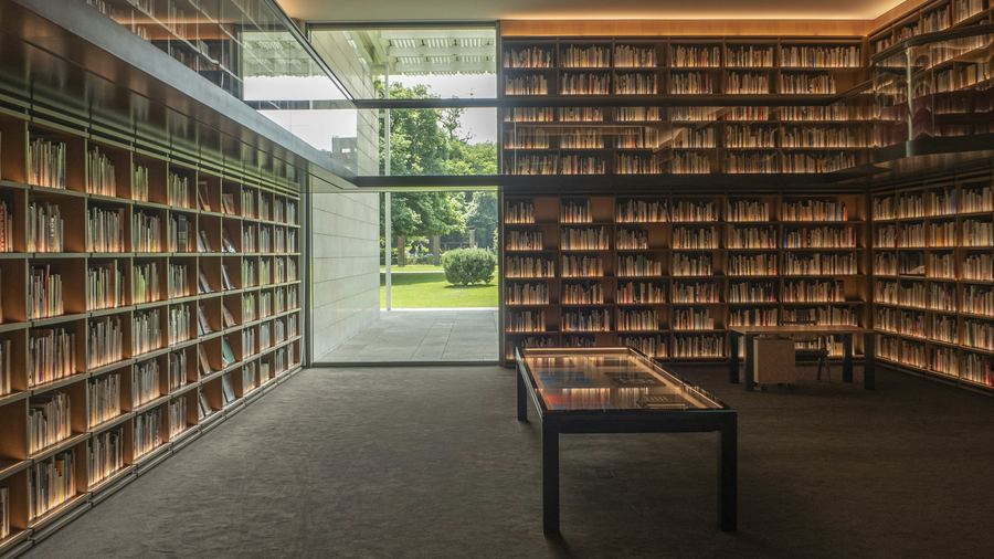 Modern Glass Library — 4K office Zoom background