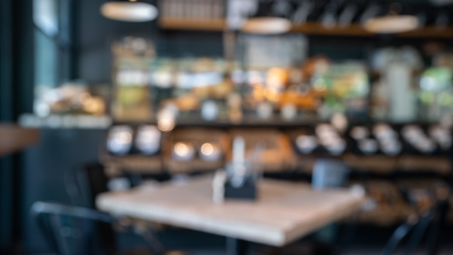 warmly blurred café interior with soft glowing bokeh from pendant lights